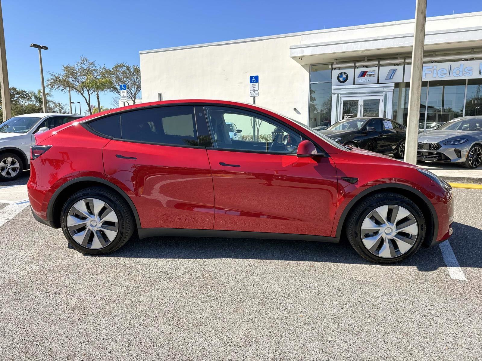 Used 2023 Tesla Model Y Long Range with VIN 7SAYGDEE8PA045709 for sale in Kansas City