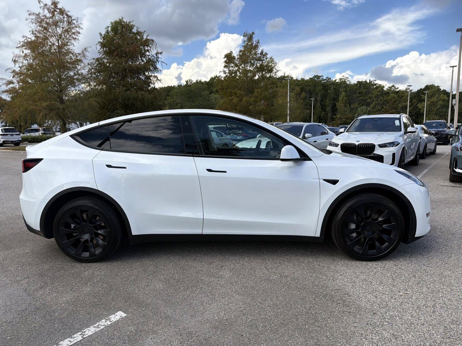 Used 2023 Tesla Model Y Long Range with VIN 7SAYGDEE3PA098849 for sale in Orlando, FL