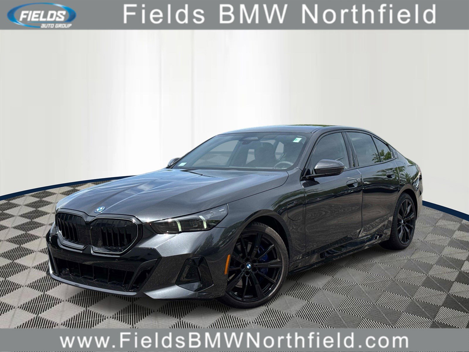 2026 BMW 5 Series 550e xDrive Sedan's photo