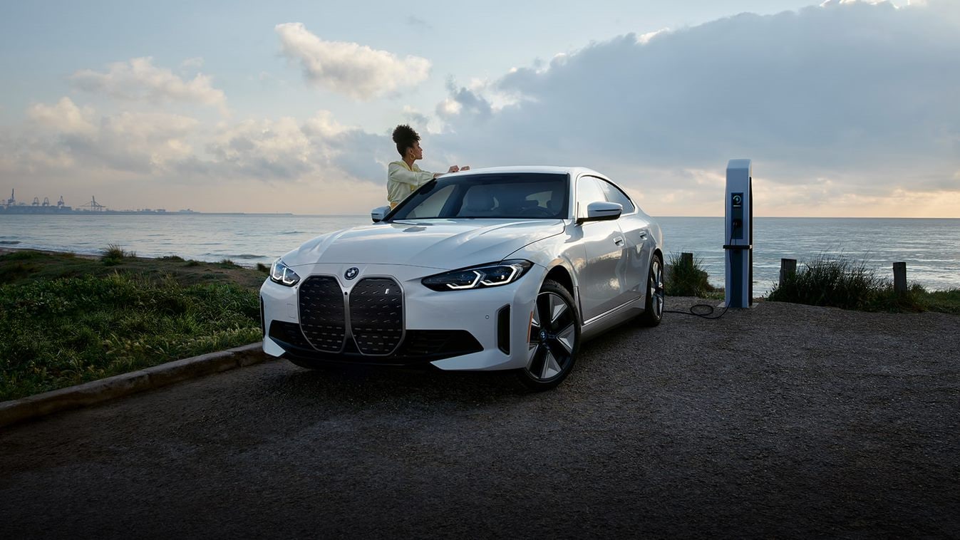 2023-bmw-i4-charge-woman.jpg