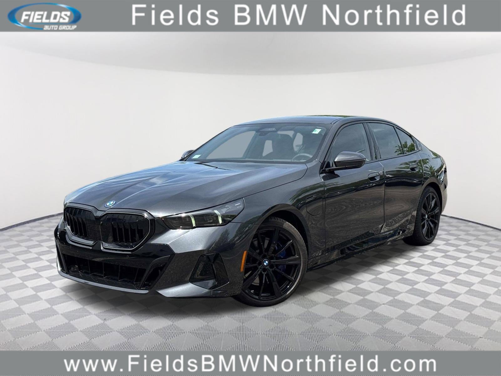 2026 BMW 5 Series 550e xDrive Sedan's photo