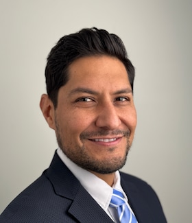 Staff member Julio Cisneros from ID_5bb2ab3ad847