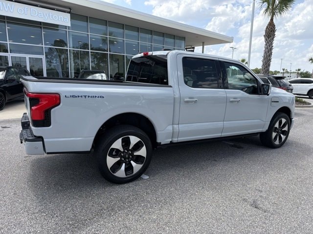 Used 2023 Ford F-150 Lightning Platinum with VIN 1FT6W1EV9PWG18959 for sale in Daytona Beach, FL