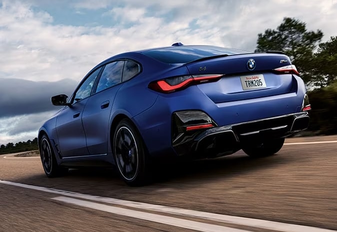 2024-bmw-i4-cruising-rear.png
