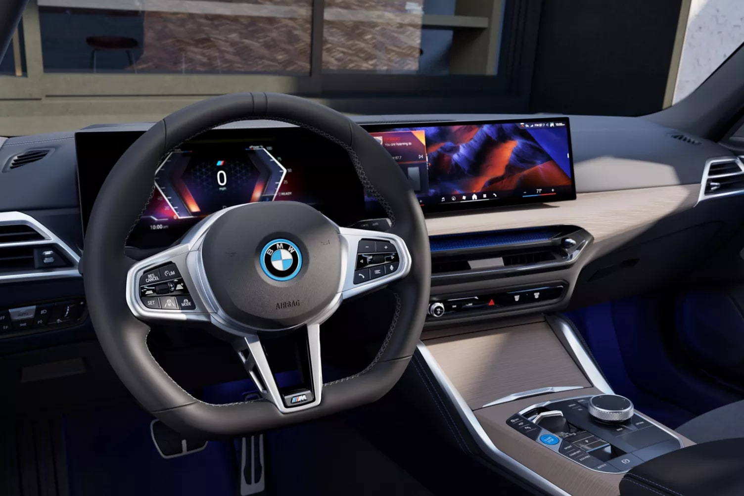 2025-bmw-i4-interior-front-dash-cockpit-close.png