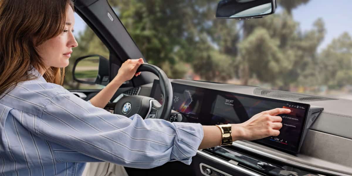 Woman using BMW Highway Assistant
