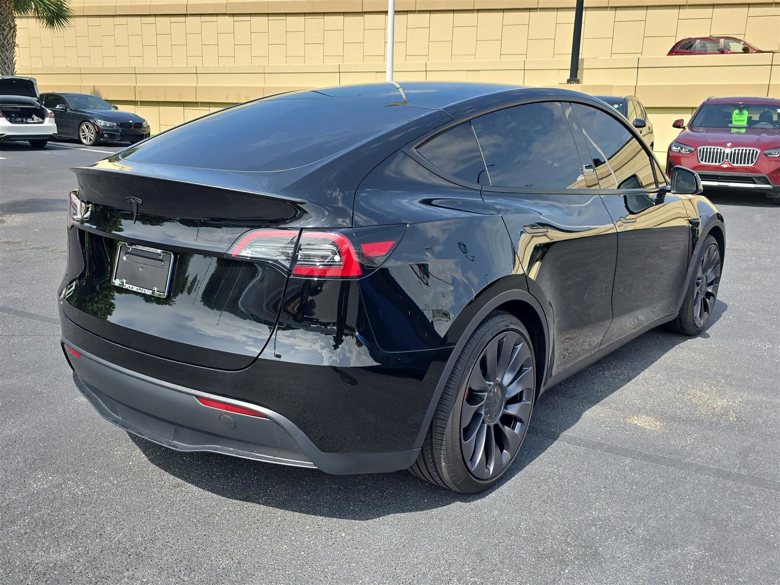 Used 2025 Tesla Model Y Performance with VIN 7SAYGDEF0SA377564 for sale in Lakeland, FL