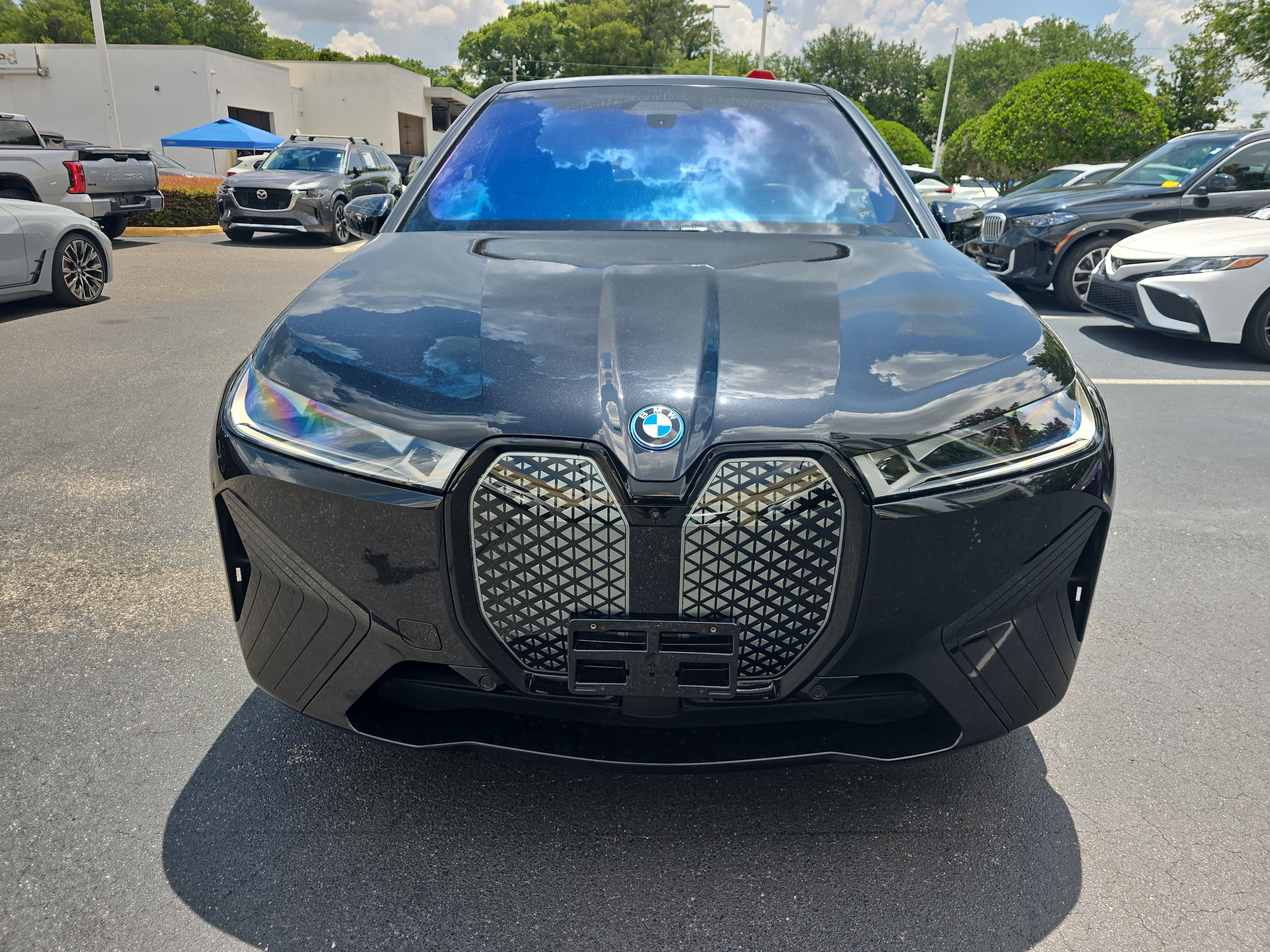 Used 2024 BMW iX Base with VIN WB523CF07RCN34841 for sale in Lakeland, FL