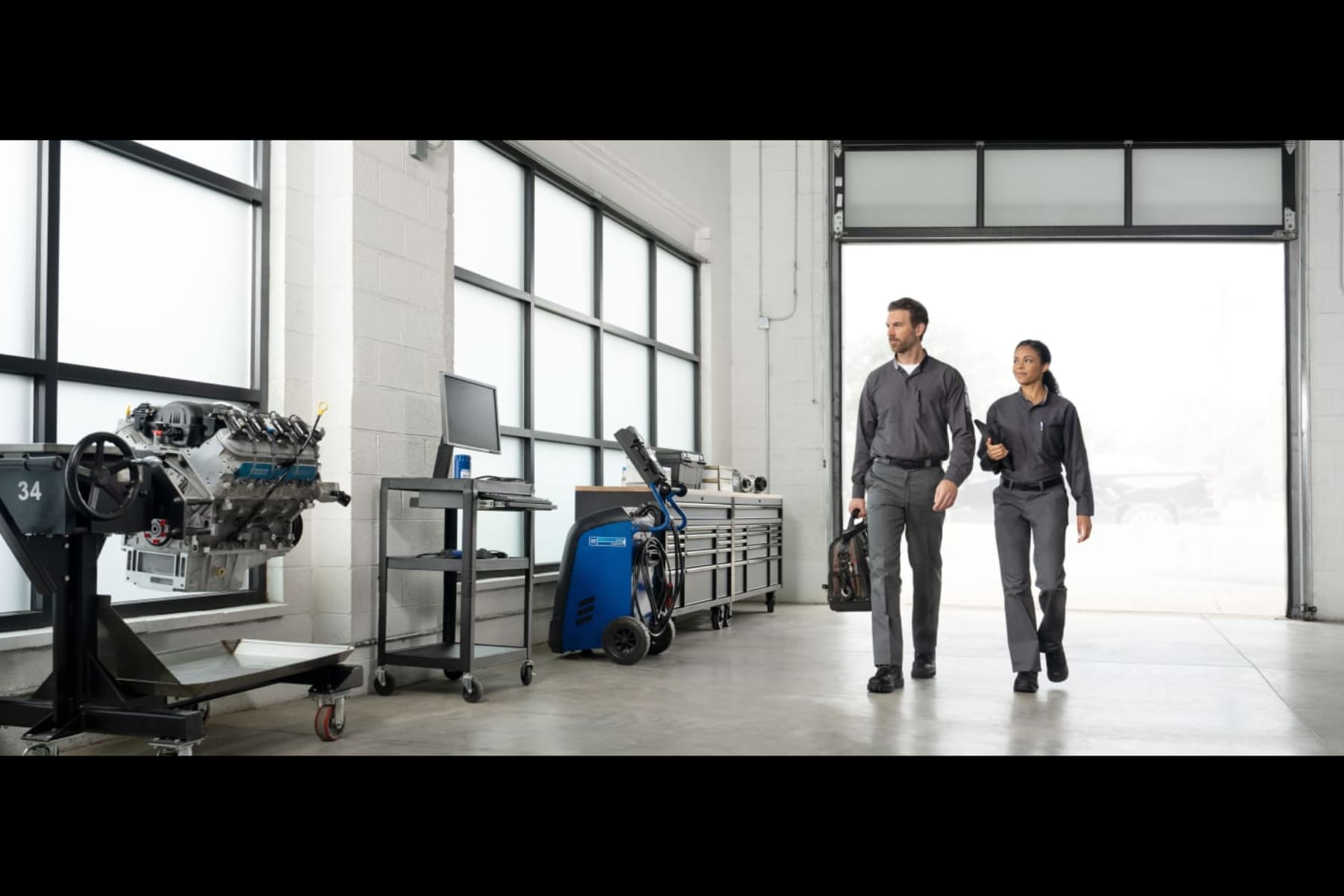 Cadillac Service Center with two technicians