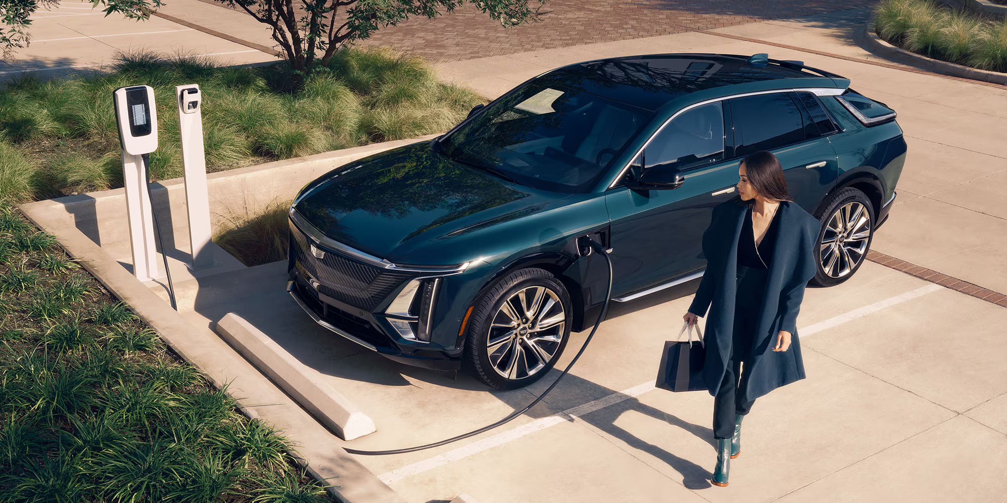 2025-cadillac-lyriq-plugged-in-woman.png