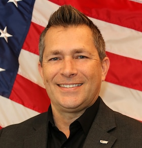 Staff member Dennis Parker from ID_e814340a8972