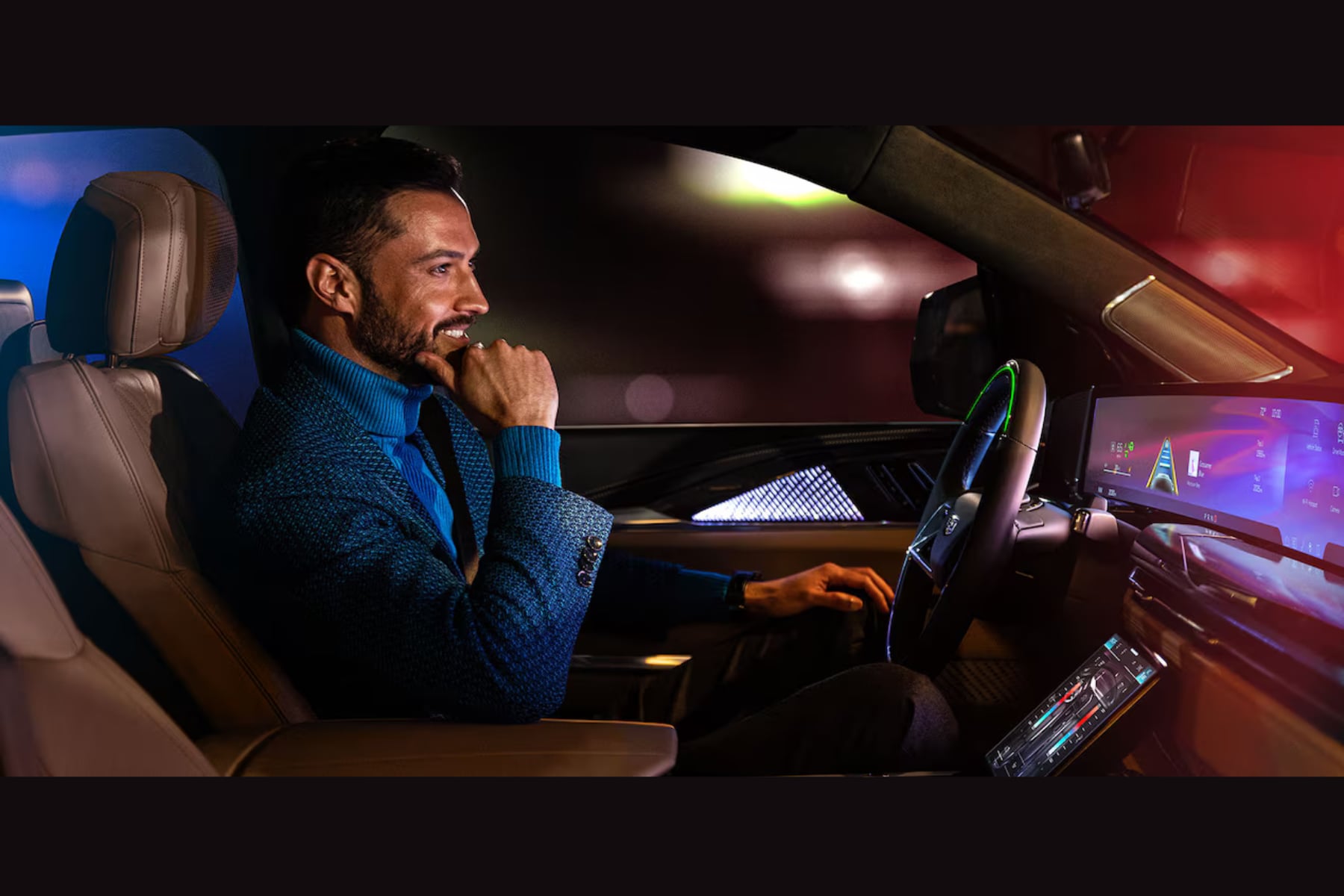 Man driving a Cadillac using safety features