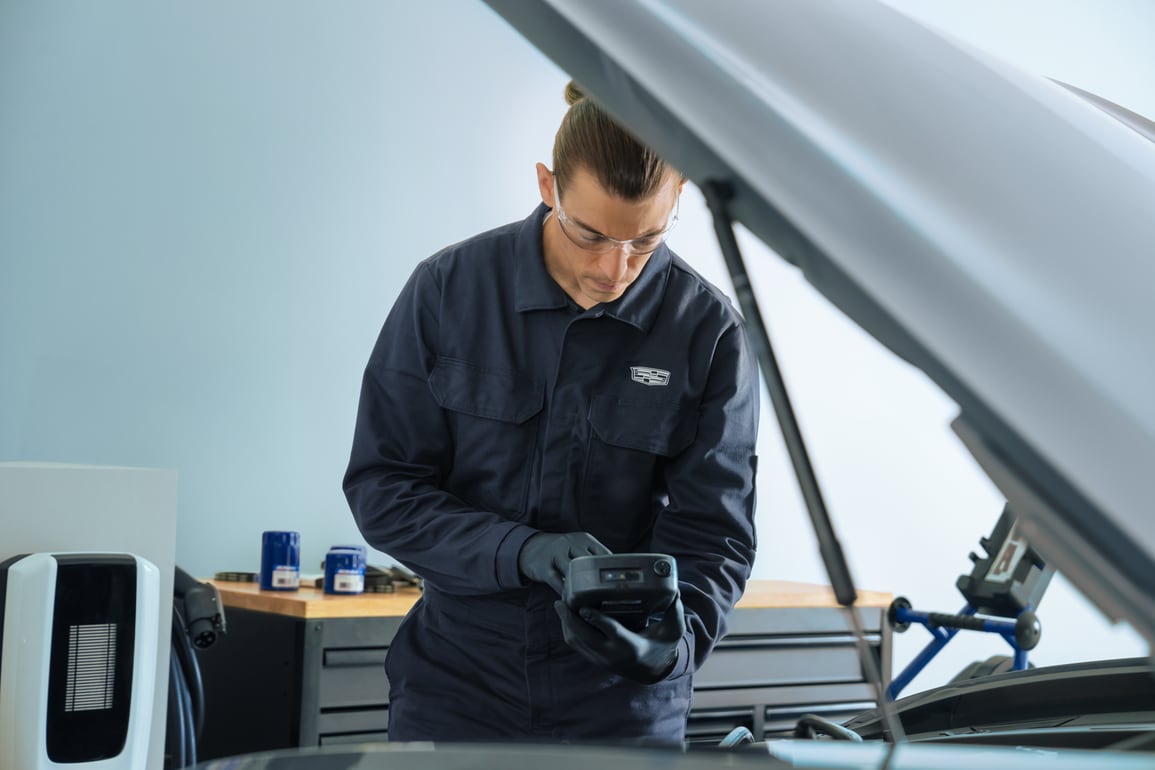 cadillac-service-man-ponytail.png