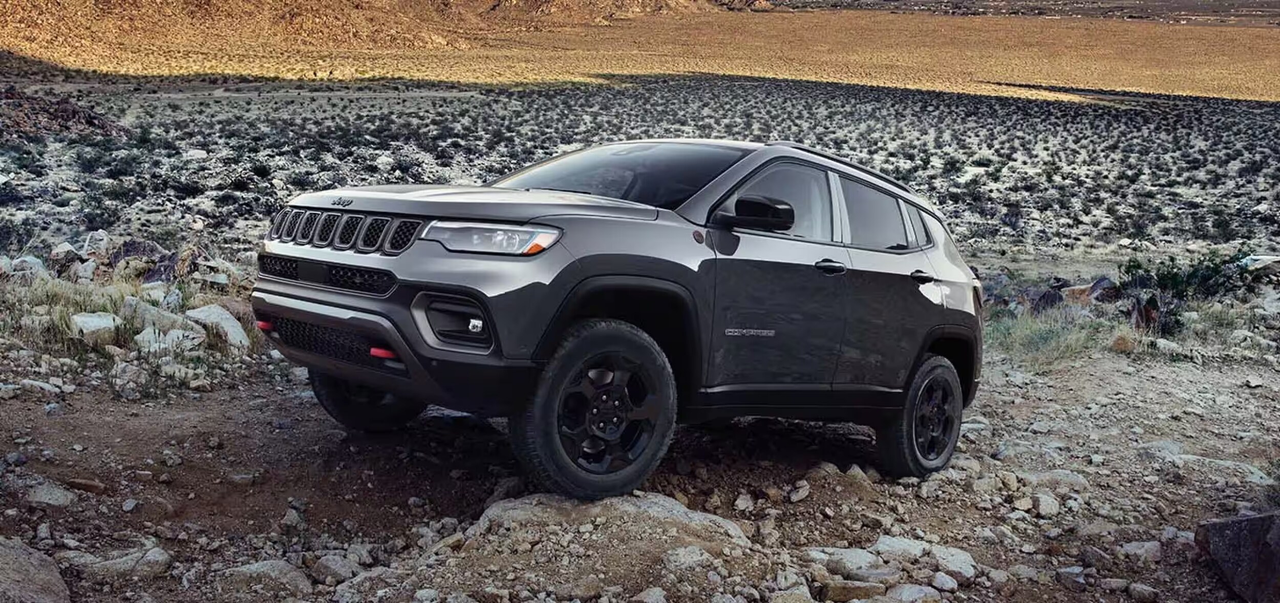 2024-jeep-compass-on-the-rocks.png