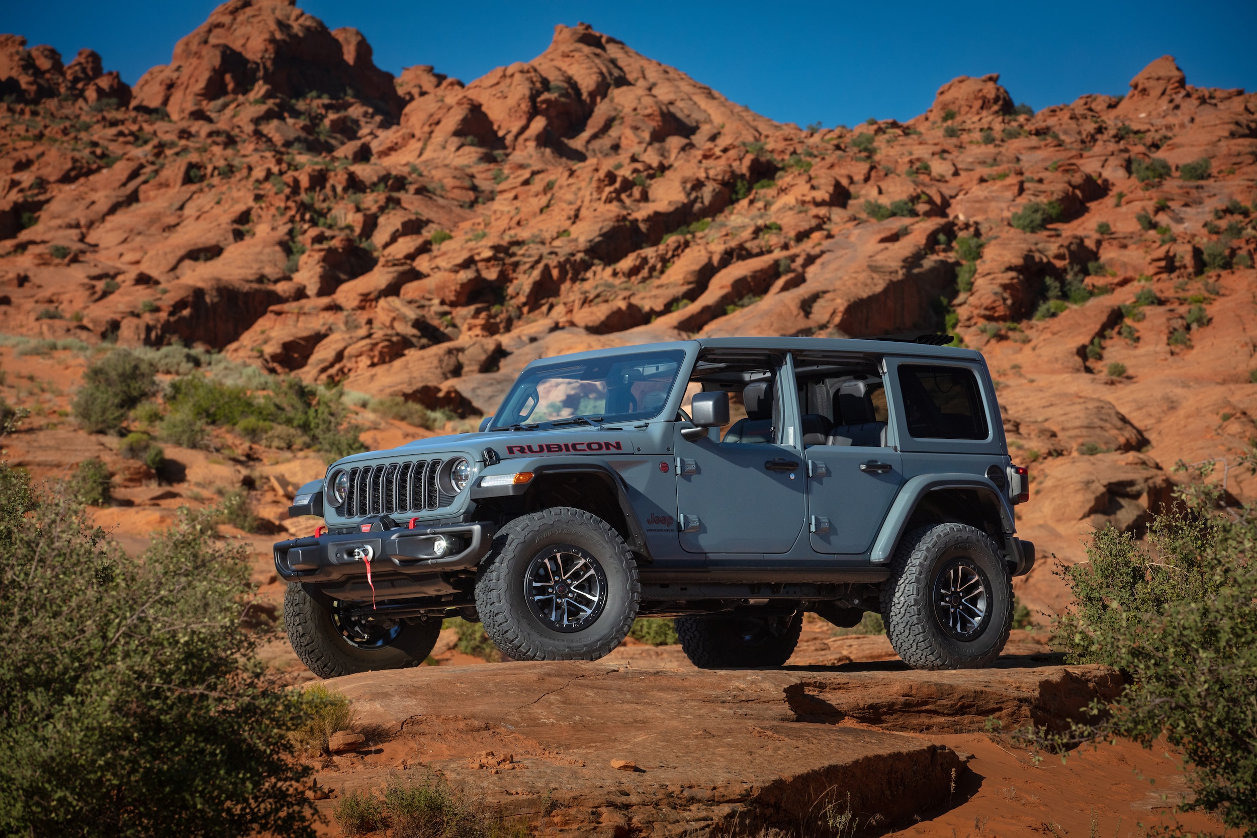 2026 Jeep Wrangler posed on rocky terrain