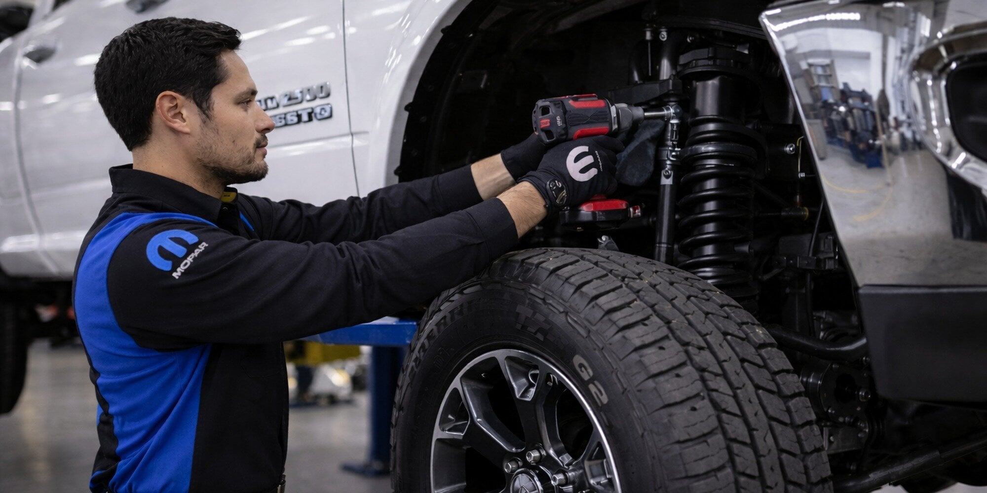 Mopar technician performing RAM suspension service