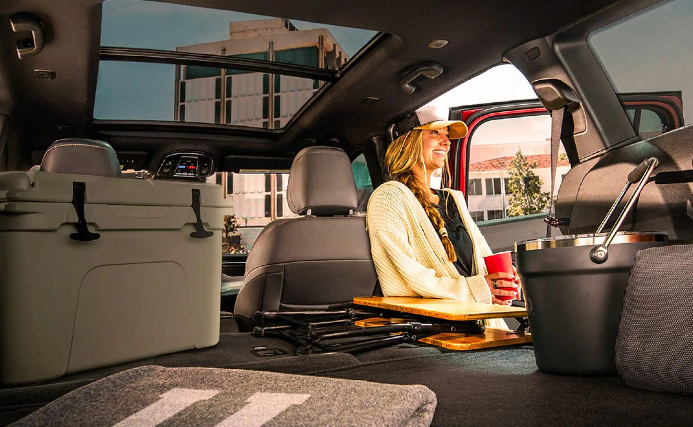 2026 Jeep Cherokee interior with cargo and woman