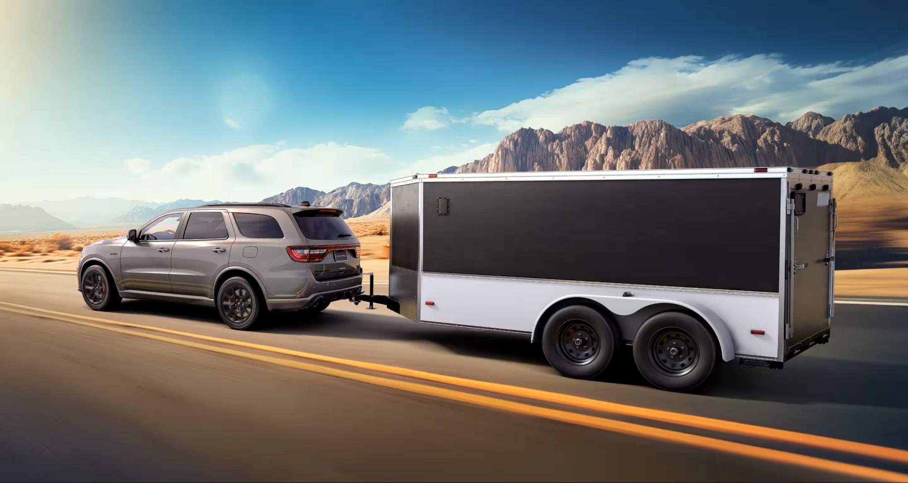2026 Dodge Durango pulling a black trailer