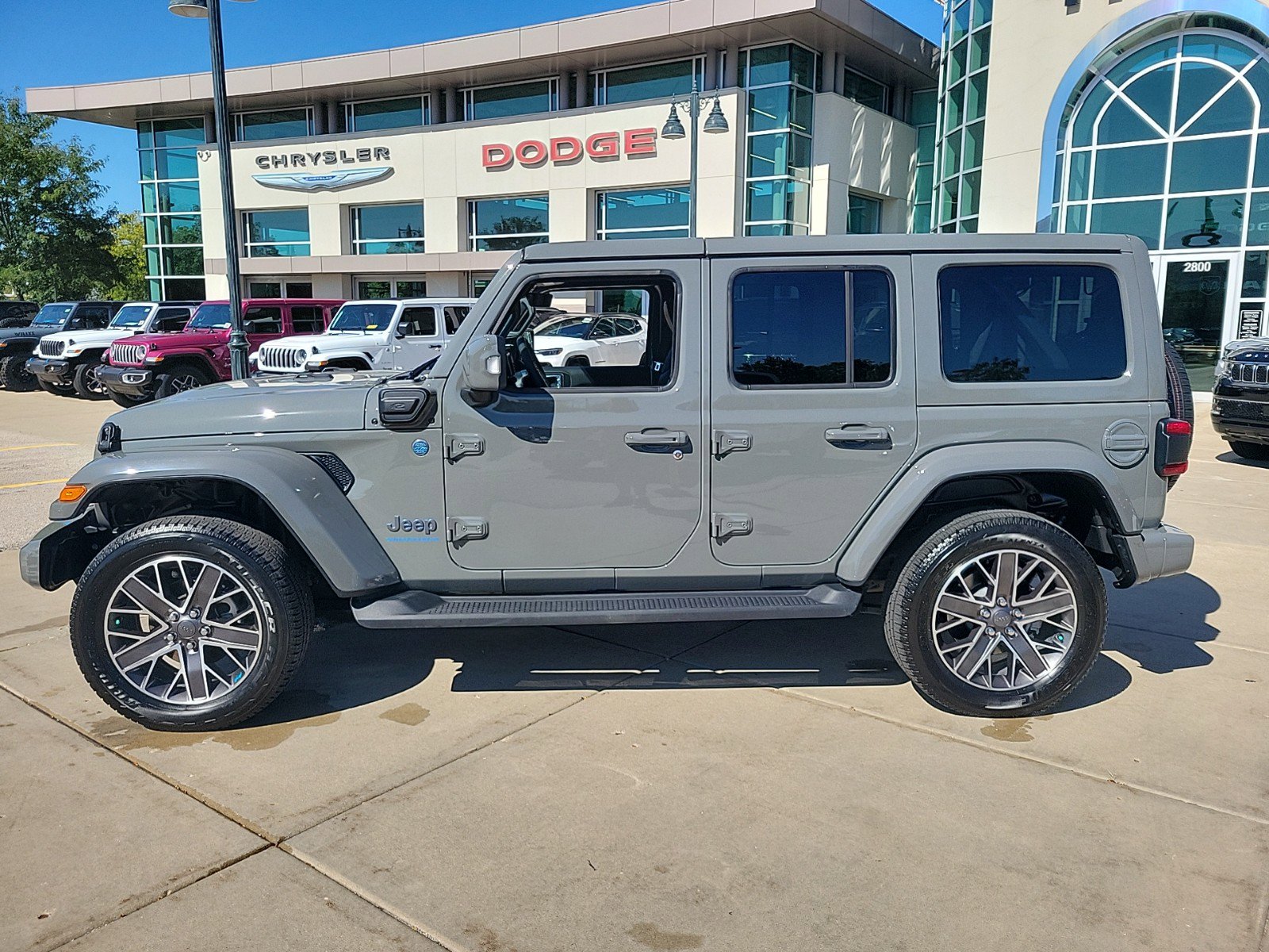 Used 2023 Jeep Wrangler 4xe High Altitude 4XE with VIN 1C4JJXP65PW605210 for sale in Glenview, IL