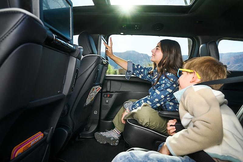 Kids in the back seat of a 2027 Chrysler Pacifica
