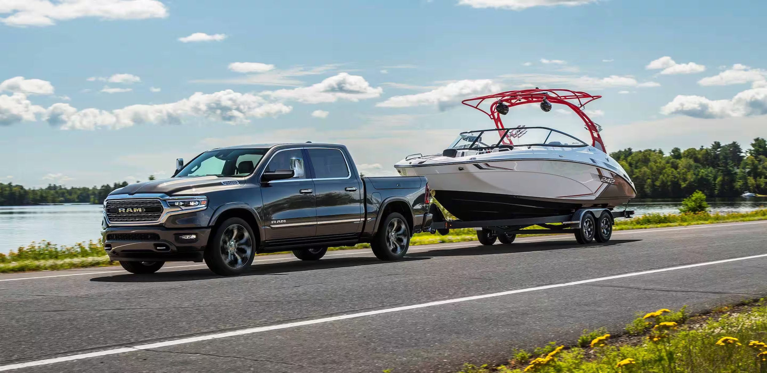 2025-ram-1500-towing-a%20different-boat.png