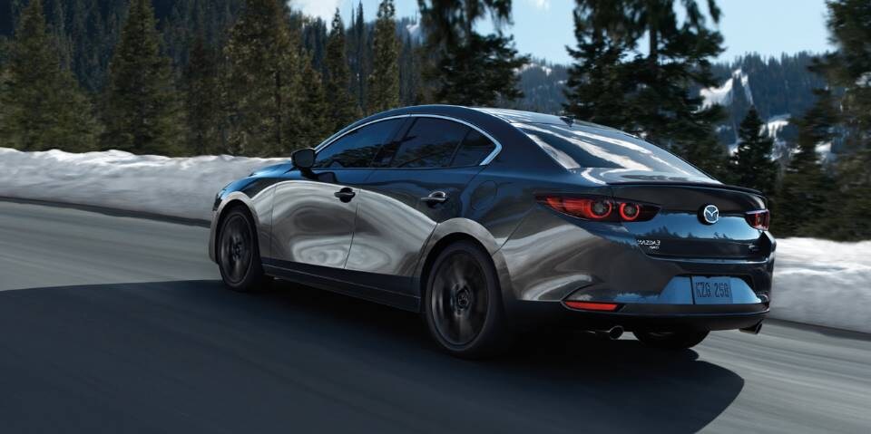 2024-mazda3-sedan-cruising.png