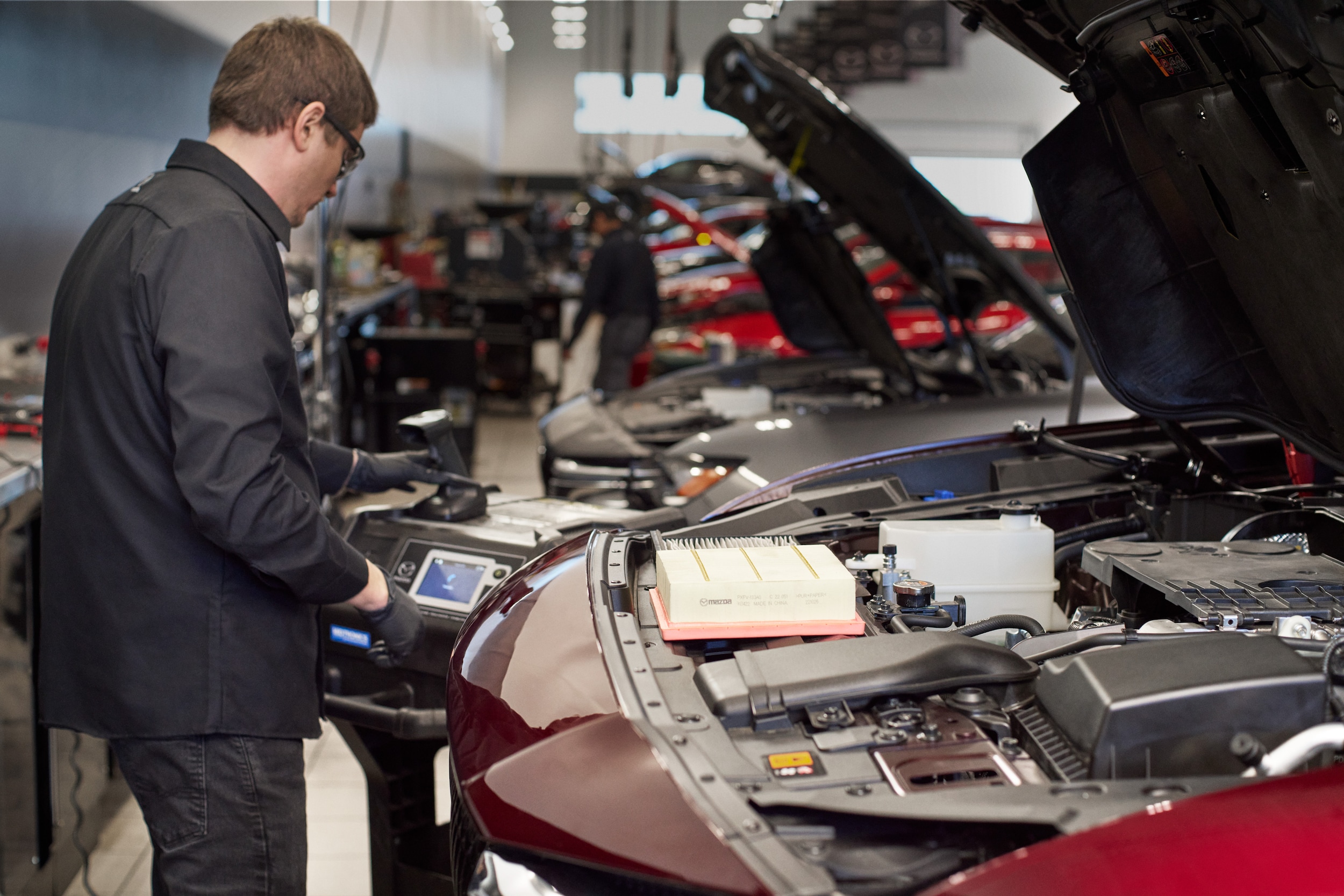 Mazda battery testing technician