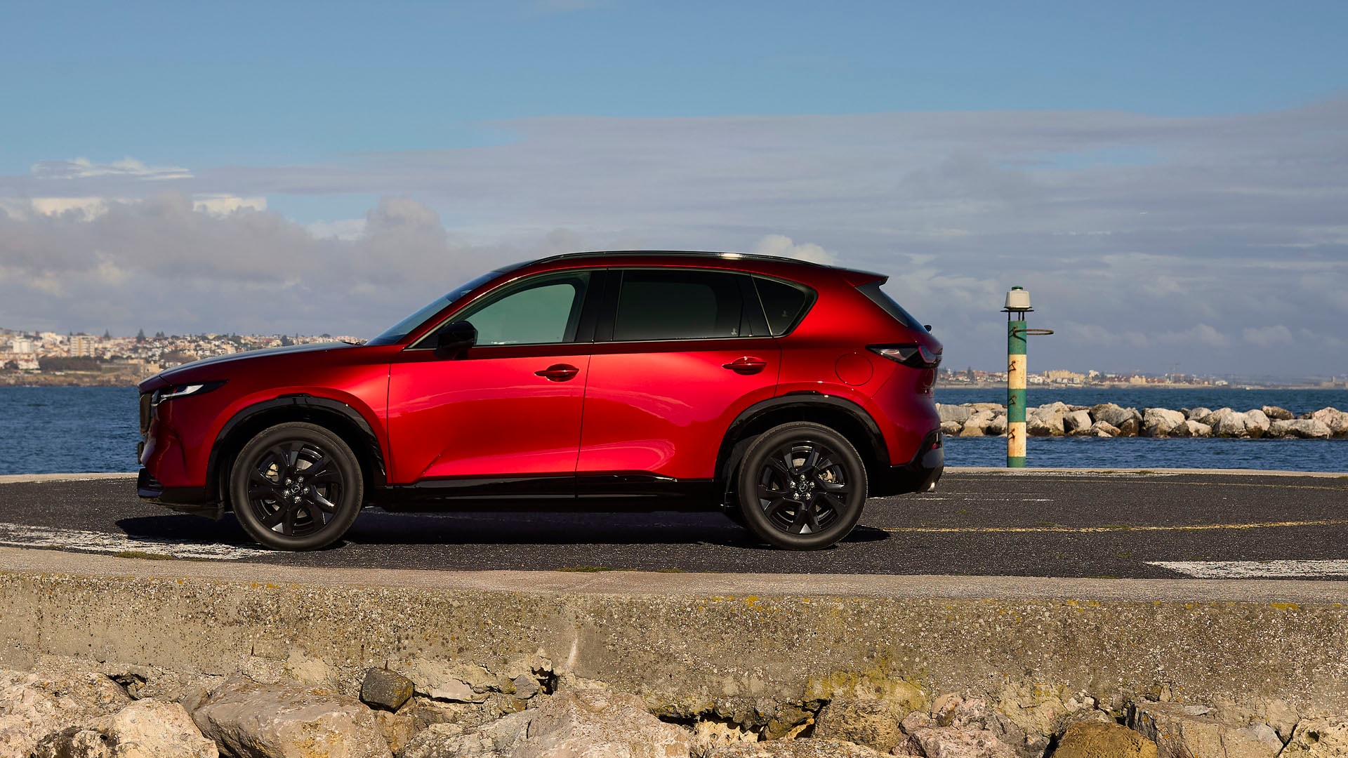 Red 2026 Mazda CX-5 at the beach