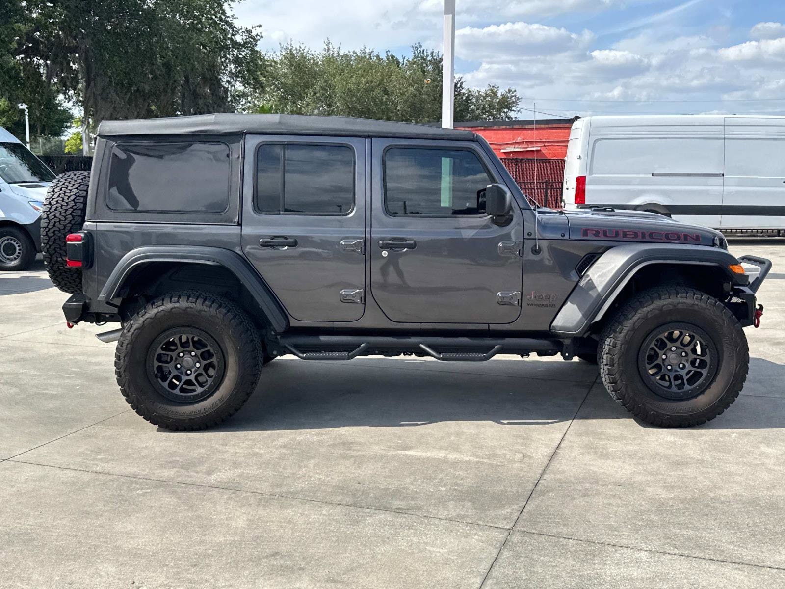 Used 2022 Jeep Wrangler Unlimited Rubicon with VIN 1C4JJXFG4NW193045 for sale in Lakeland, FL