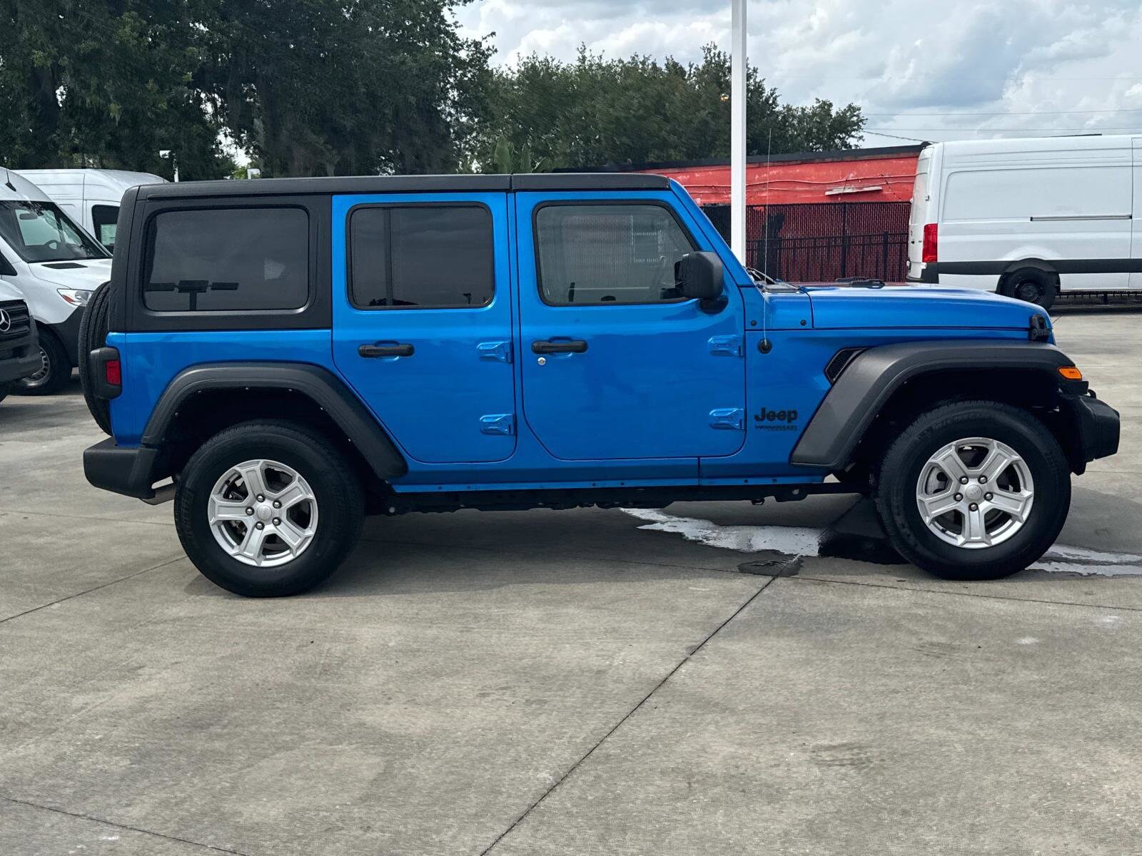 Used 2022 Jeep Wrangler Unlimited Sport S with VIN 1C4HJXDN2NW174395 for sale in Lakeland, FL