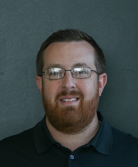 Staff member Joe Whelan from ID_3e208dc9694a