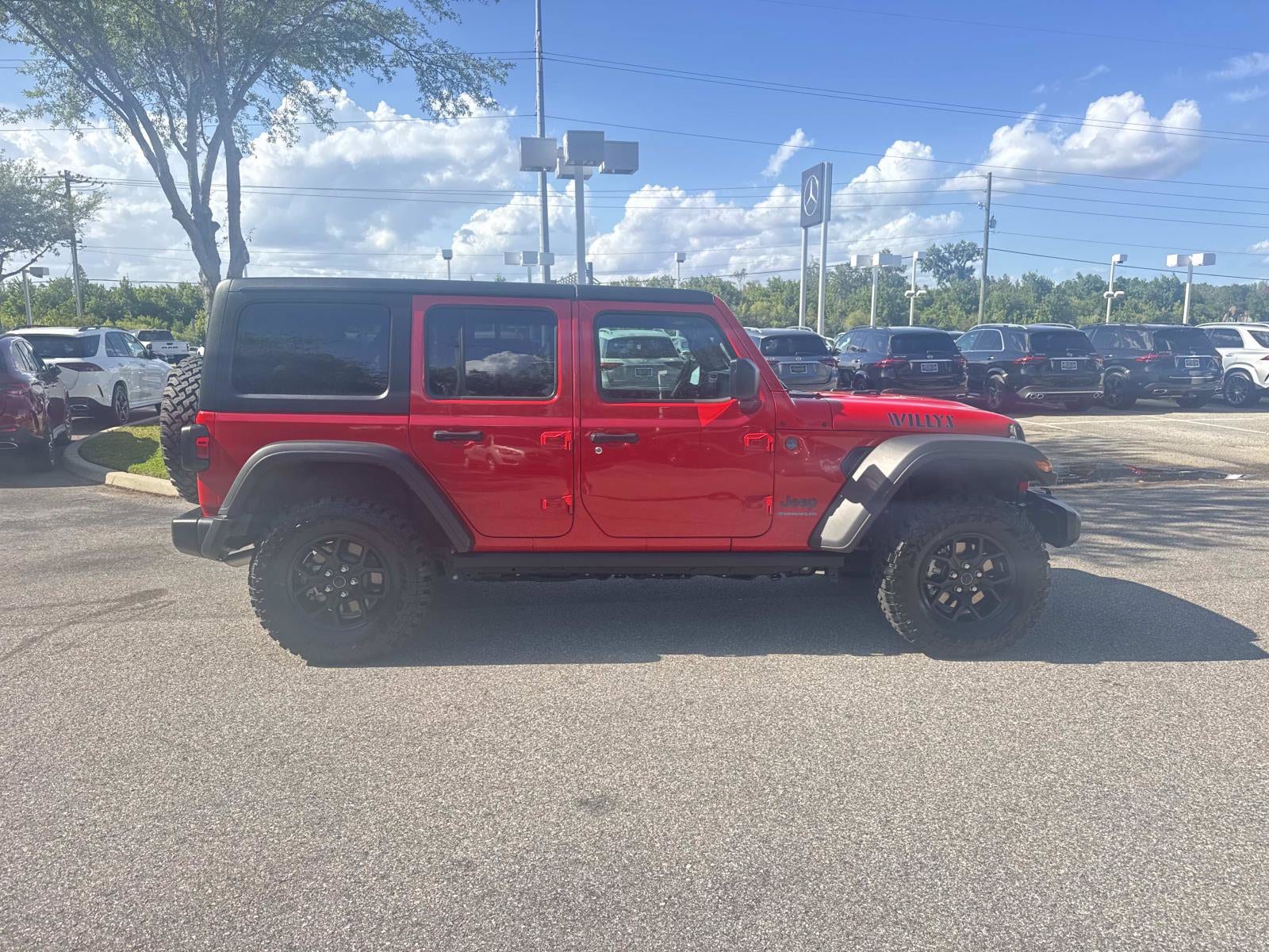 Used 2025 Jeep Wrangler 4xe Willys 4XE with VIN 1C4RJXN67SW585993 for sale in Lakeland, FL