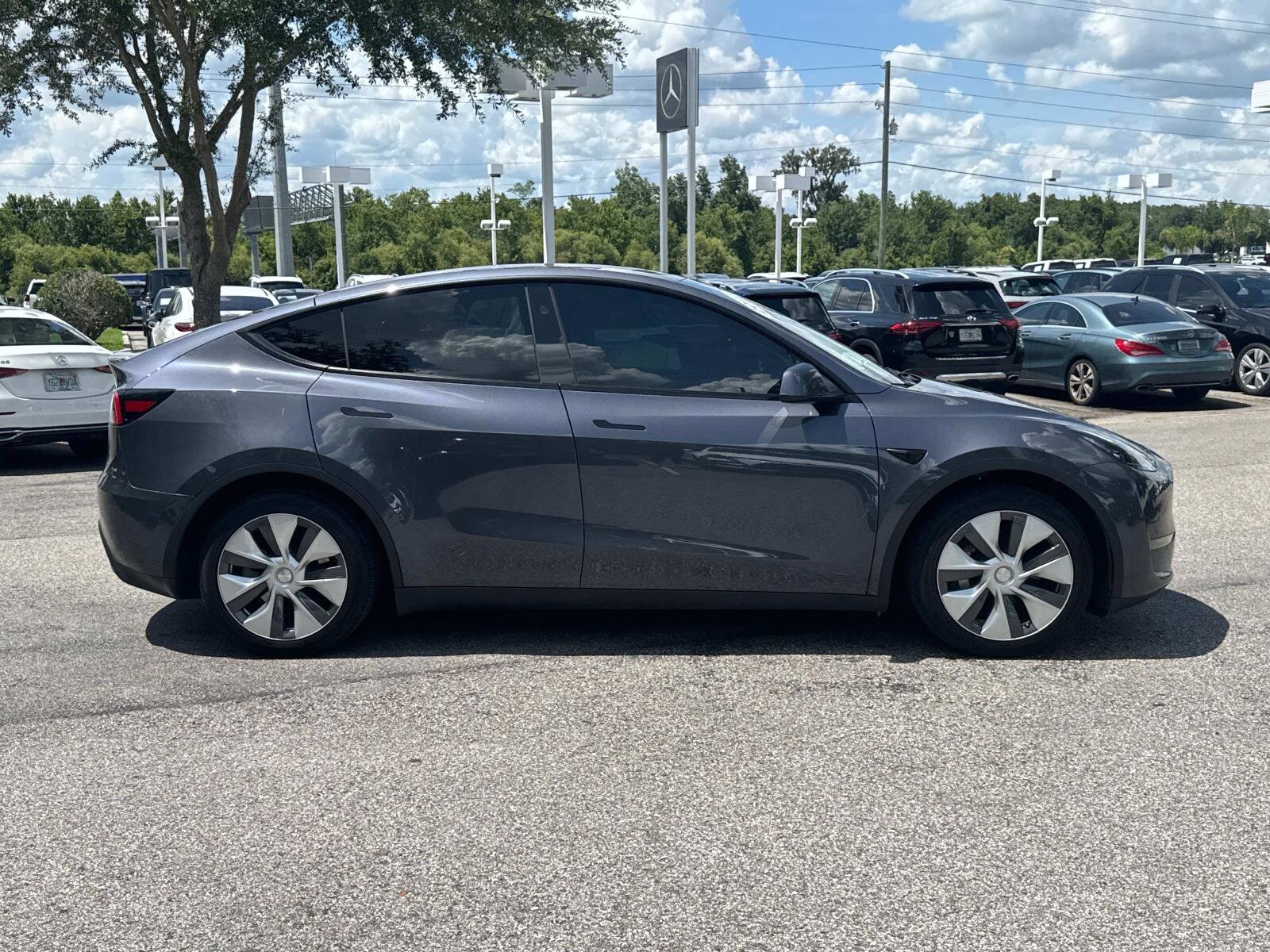 Used 2023 Tesla Model Y Long Range with VIN 7SAYGAEE8PF853012 for sale in Lakeland, FL