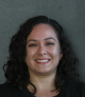 Staff member Joan Rodriguez from ID_9dda63de4477