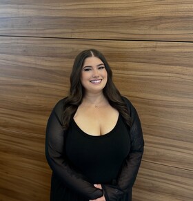 Staff member Saoirse West from ID_417514