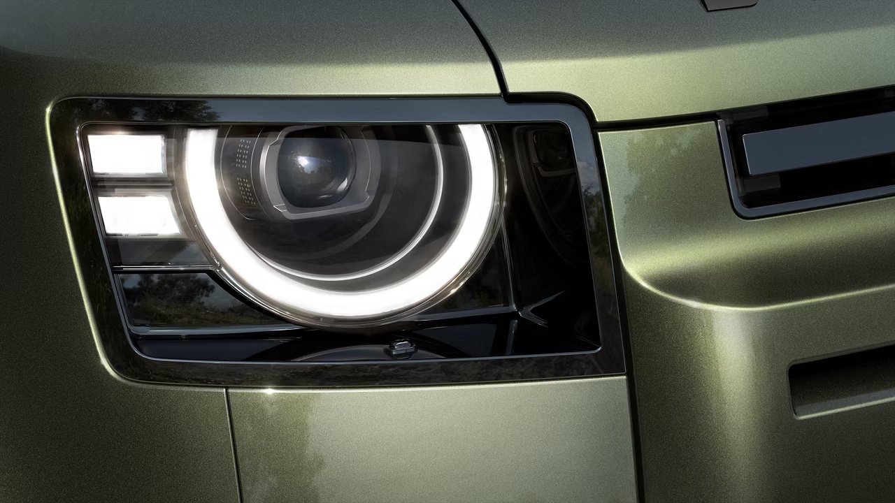 Close-up image of the front headlight area of a Defender by Land Rover