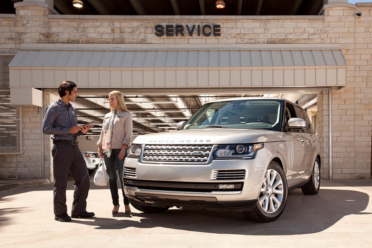 Land Rover Service Center, with a client and dealer