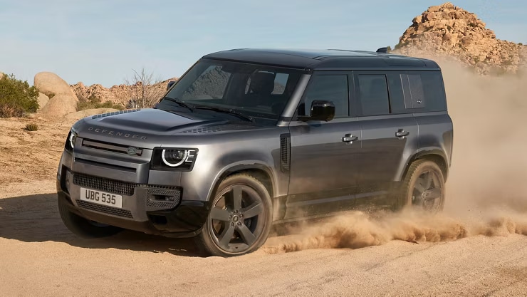2025-land-rover-defender-kicking-dirt.png
