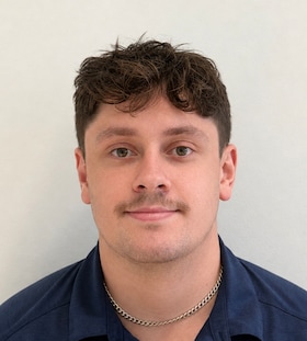Staff member Logan Gable from ID_48cbaabc56cc