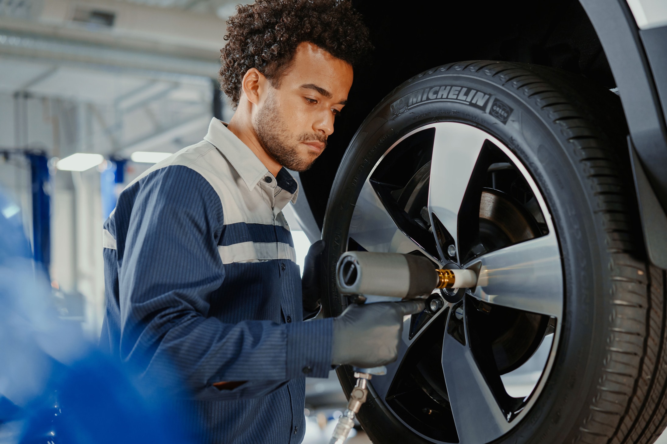 Volvo technician mounting a tire