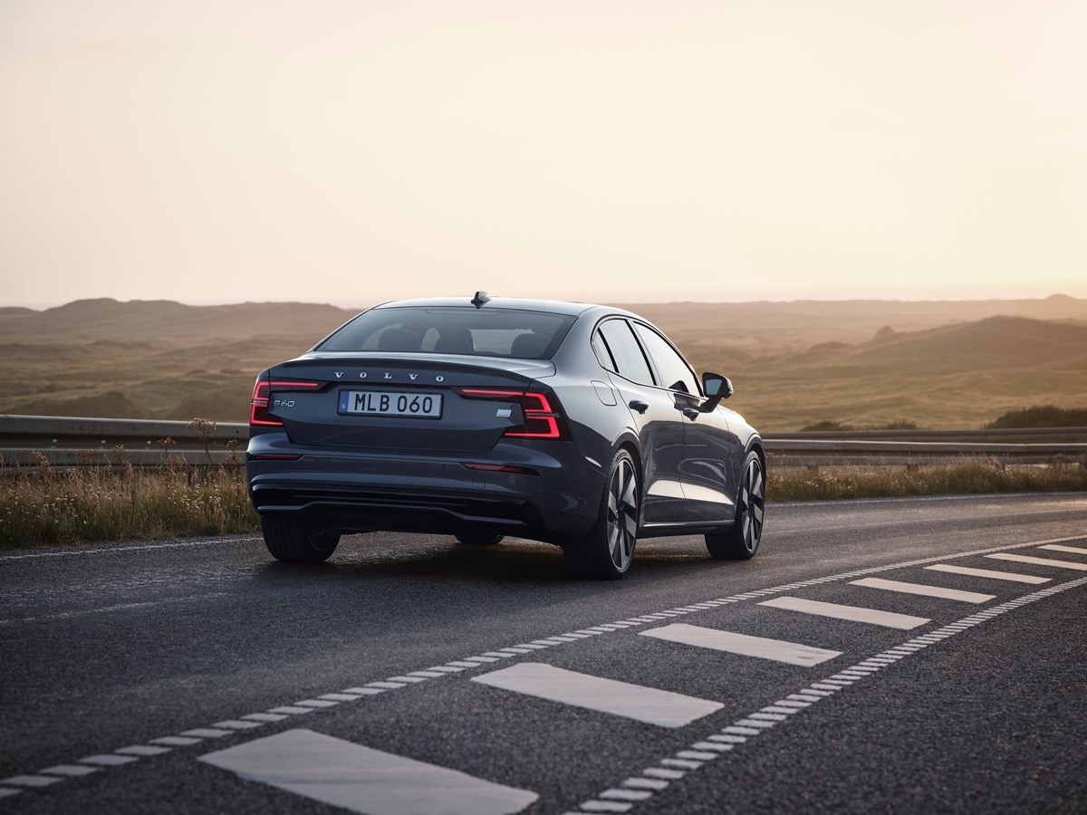 2024 Volvo S60 driving down the road