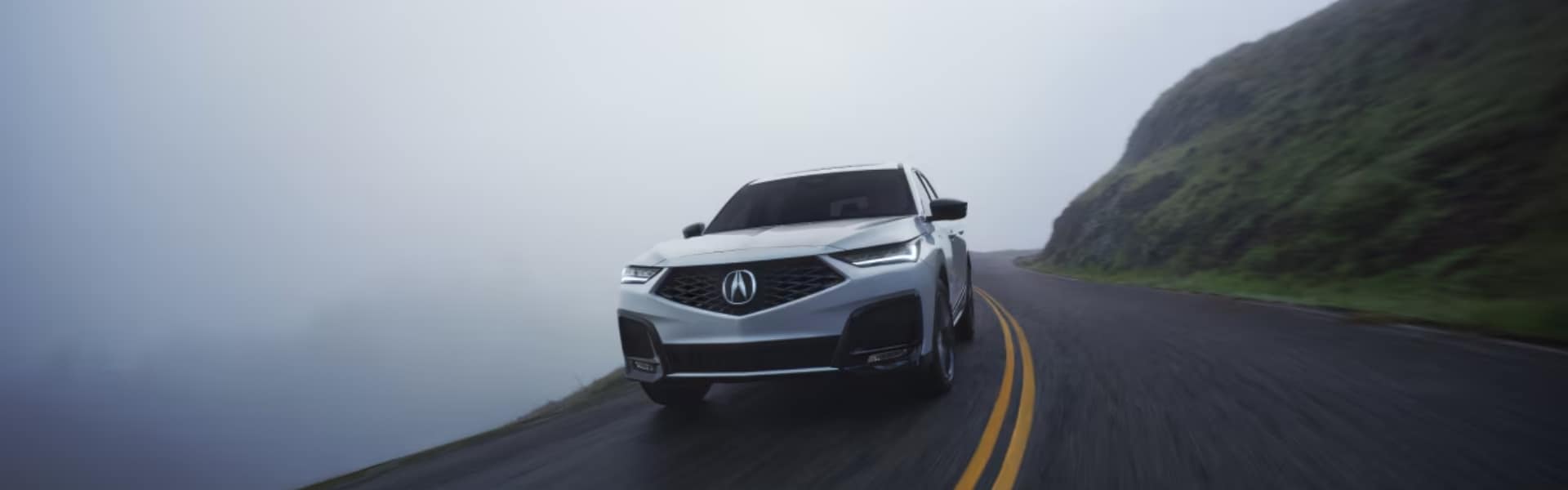Acura MDX on foggy road