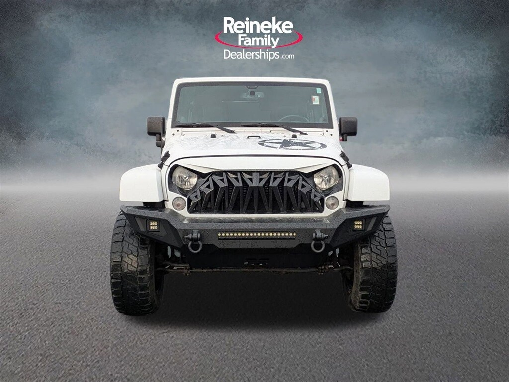 Used 2014 Jeep Wrangler Unlimited Sport with VIN 1C4BJWDG6EL196001 for sale in Findlay, OH