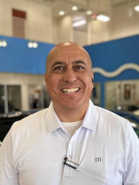 Staff member Nelson Gil from ID_709370