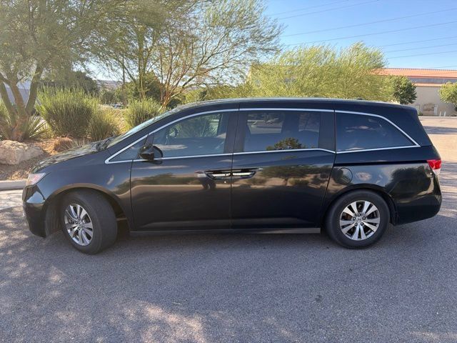 Used 2014 Honda Odyssey EX-L with VIN 5FNRL5H62EB079569 for sale in St. George, UT