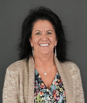 Staff member Cindy Cox from ID_a9f9c082451b