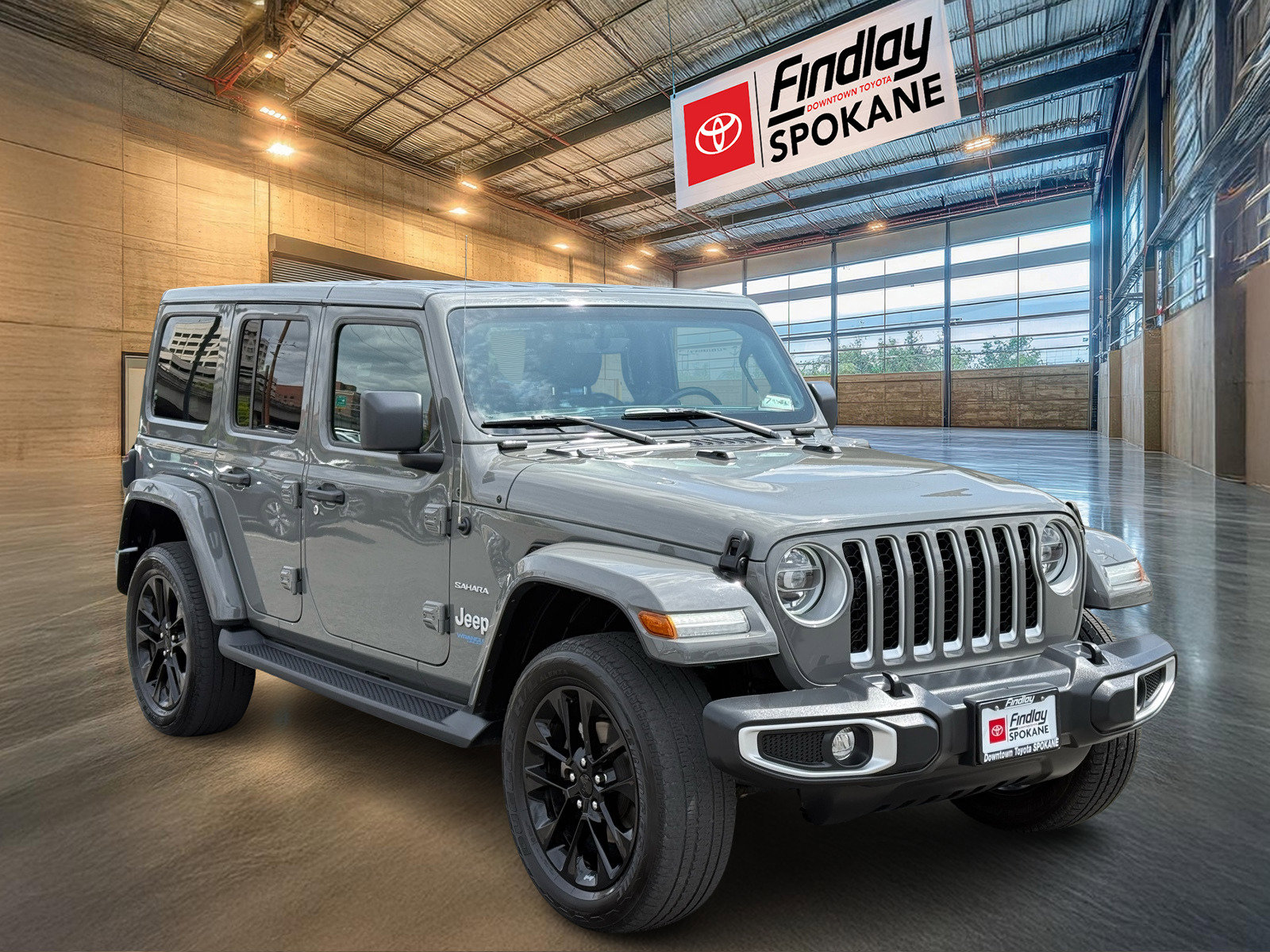 Used 2021 Jeep Wrangler Unlimited Sahara 4XE with VIN 1C4JJXP63MW702918 for sale in Spokane, WA