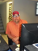 Staff member LYLE KNIGHT from ID_5ba4ad9f5ee6