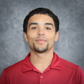 Staff member Andrew Olaniyan from e1b685197e55