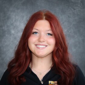 Staff member Mackenzie Moore from 13b82bf19f41